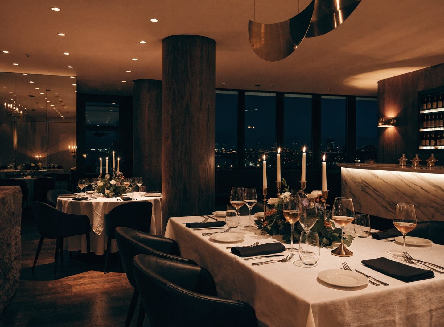 Refined hotel restaurant set for an evening service