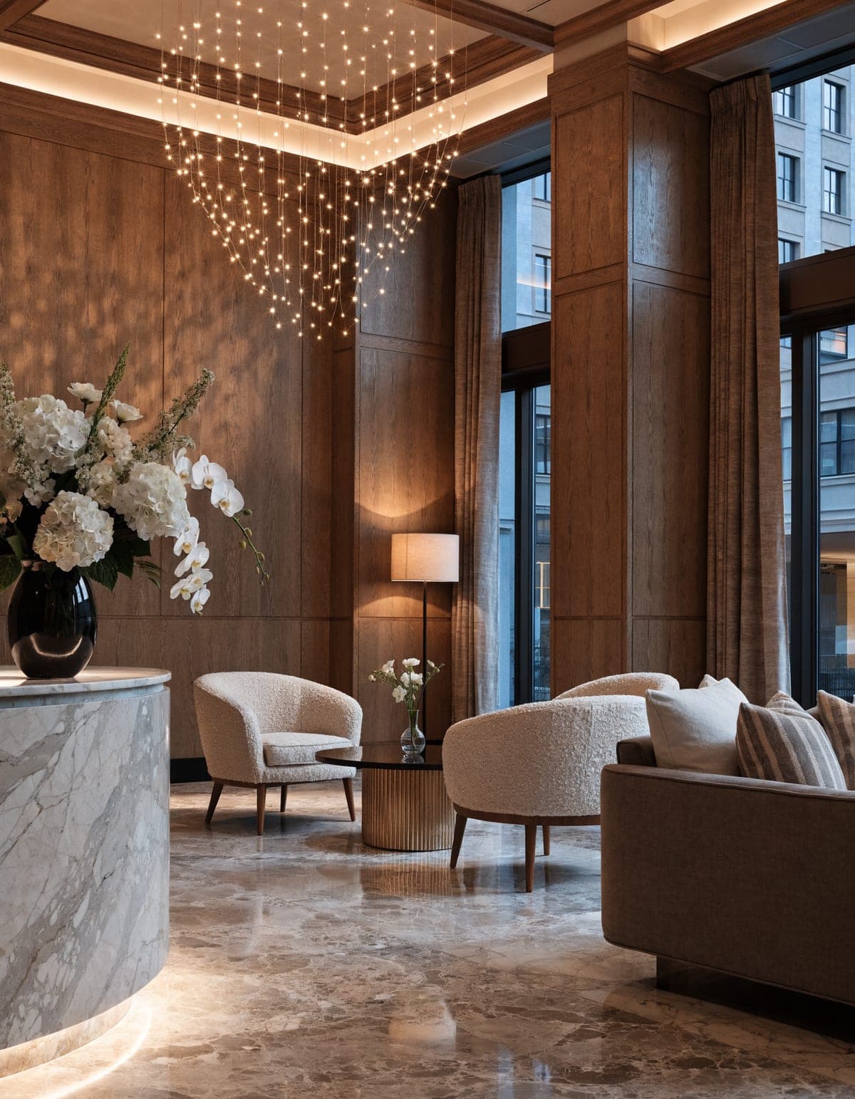 Elegant hotel lobby with warm lighting and refined furnishings